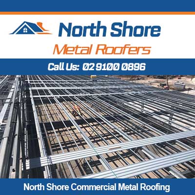 Commercial metal roofing installation in progress on North Shore building