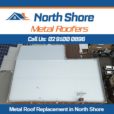 Aerial view of metal roof replacement on North Shore commercial building